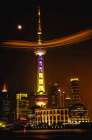 Shanghai TV Tower, Pudong, Night shot with moon and blimp Art Print